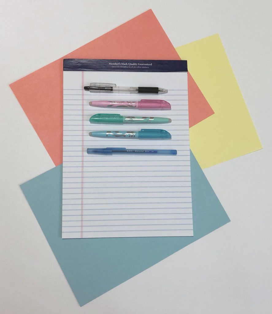 notepad with pens